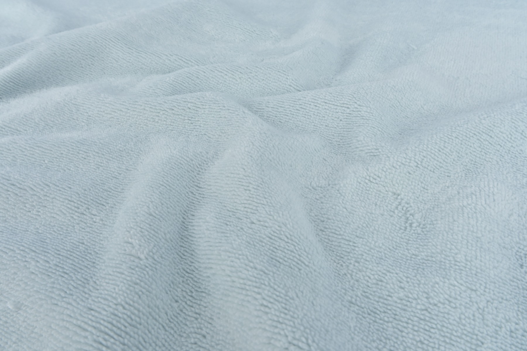 Close-up of soft bamboo towelling with a flexible looped texture